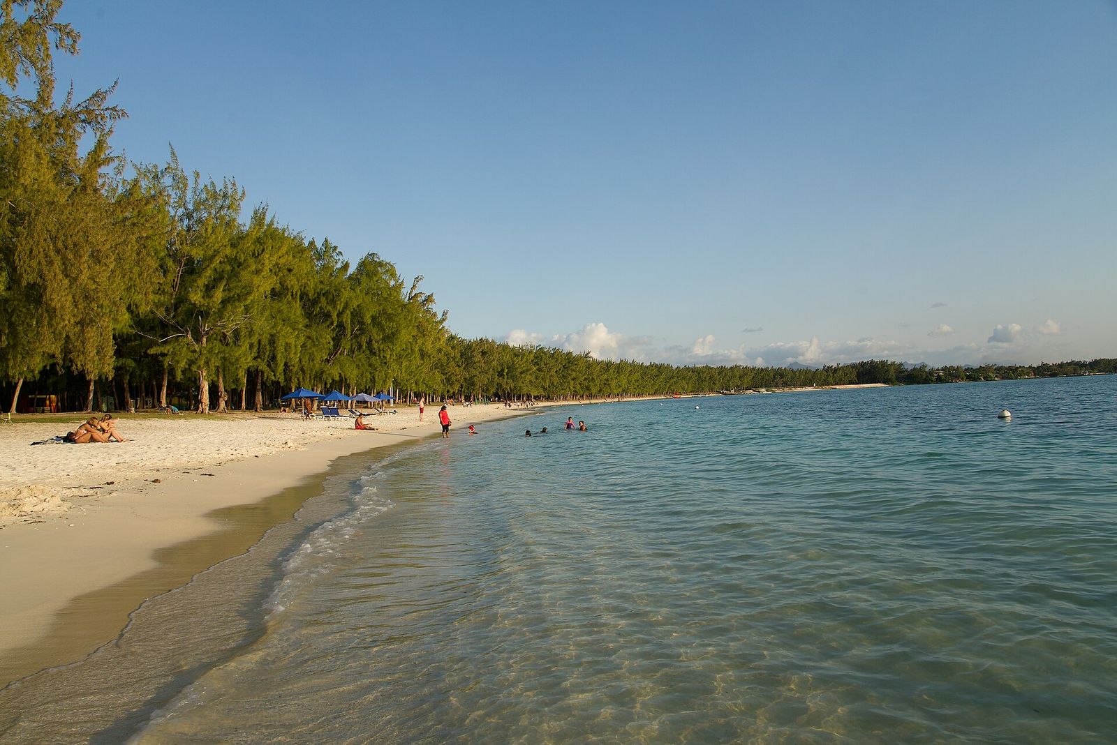 Beachgoers at Mont Choisy beach, Mauritius